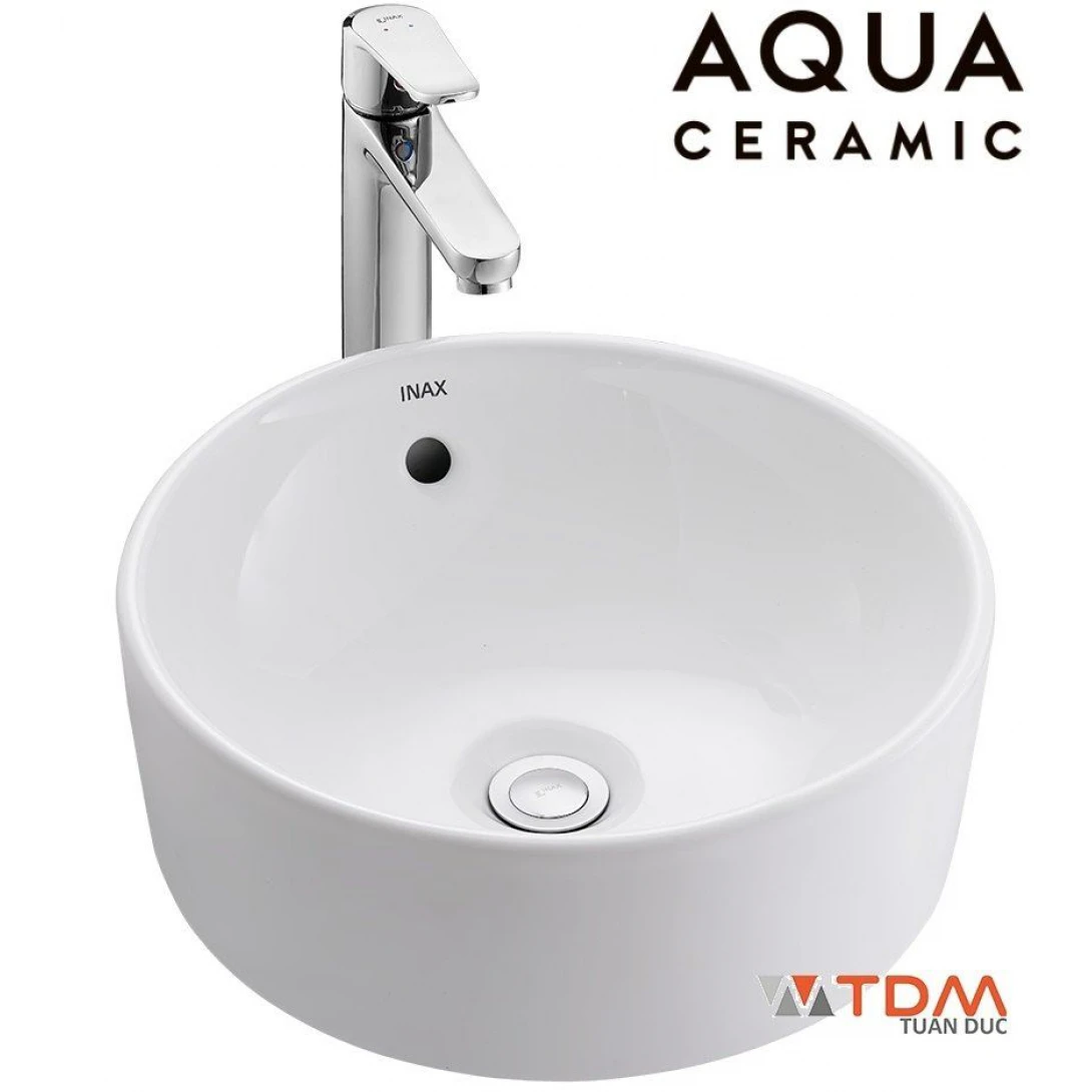 Chậu rửa mặt lavabo Inax AL-295V đặt trên bàn đá 380 x 380 mm