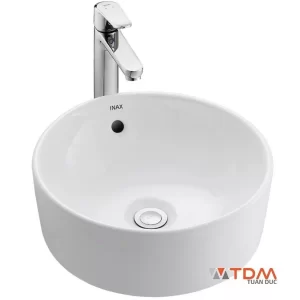 Chậu rửa mặt lavabo Inax L-295V đặt trên bàn đá tròn 380 x 380 mm